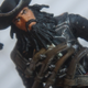 Image for article titled I'm Playing Assassin's Creed IV Right Now. On My Desk. With Toys.